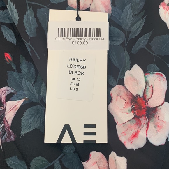 NWT Angel Eye London dress. Size medium. Comfy and cute. - Picture 2 of 5